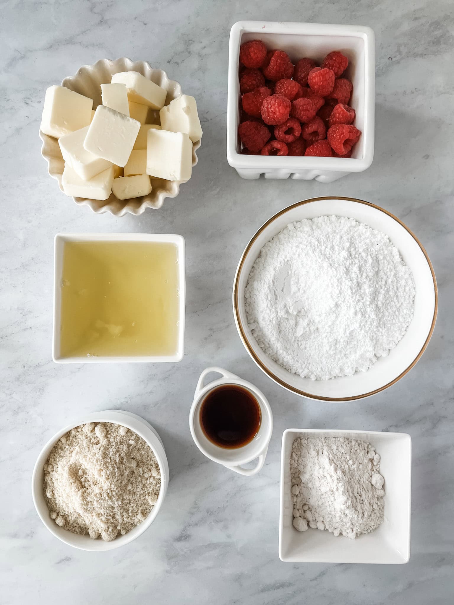 Raspberry financier ingredients laying on a table