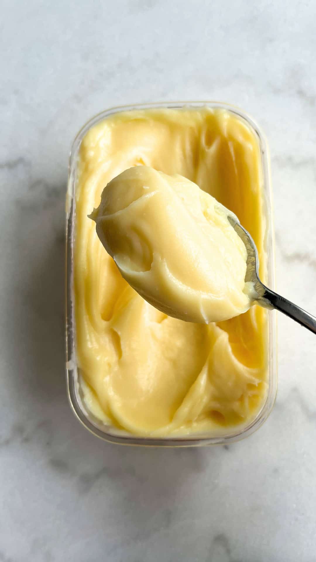 Cream cheese fudge in a spoon ready to be served