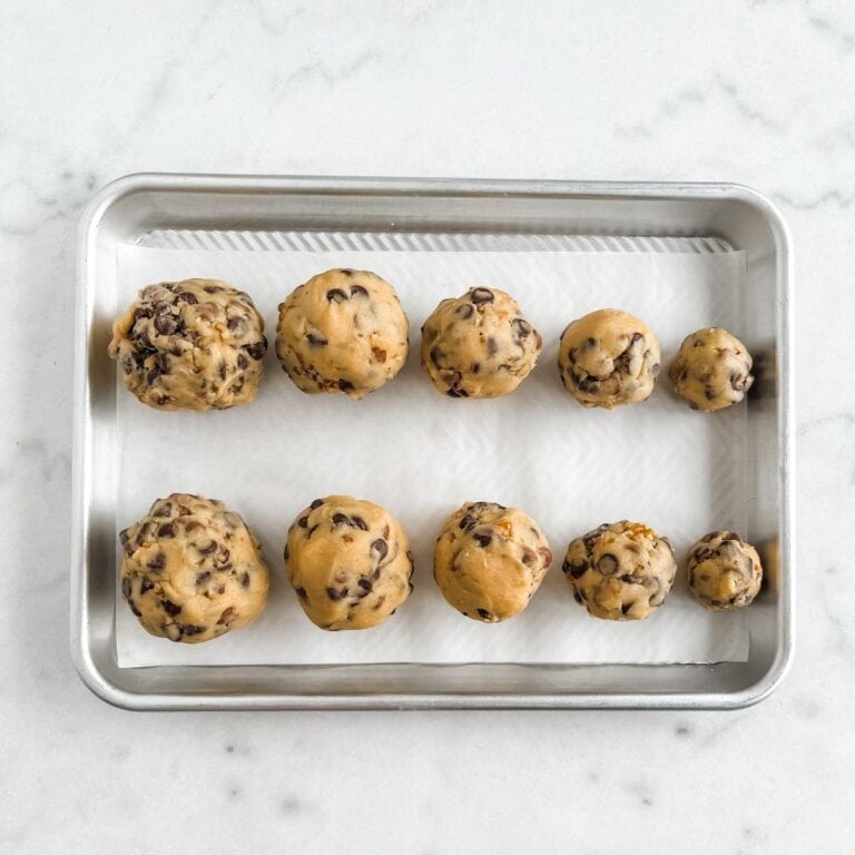 Cookies in a baking sheet from the biggest to the smallest in accurate measurements.